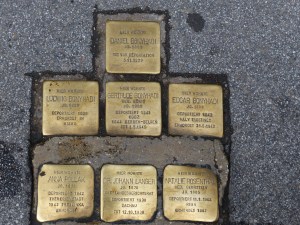 But don't just look up in Salzburg to awe at the steeples. Look down, embedded into the sidewalk in front of banks, homes and other buildings. This is also Salzburg.
